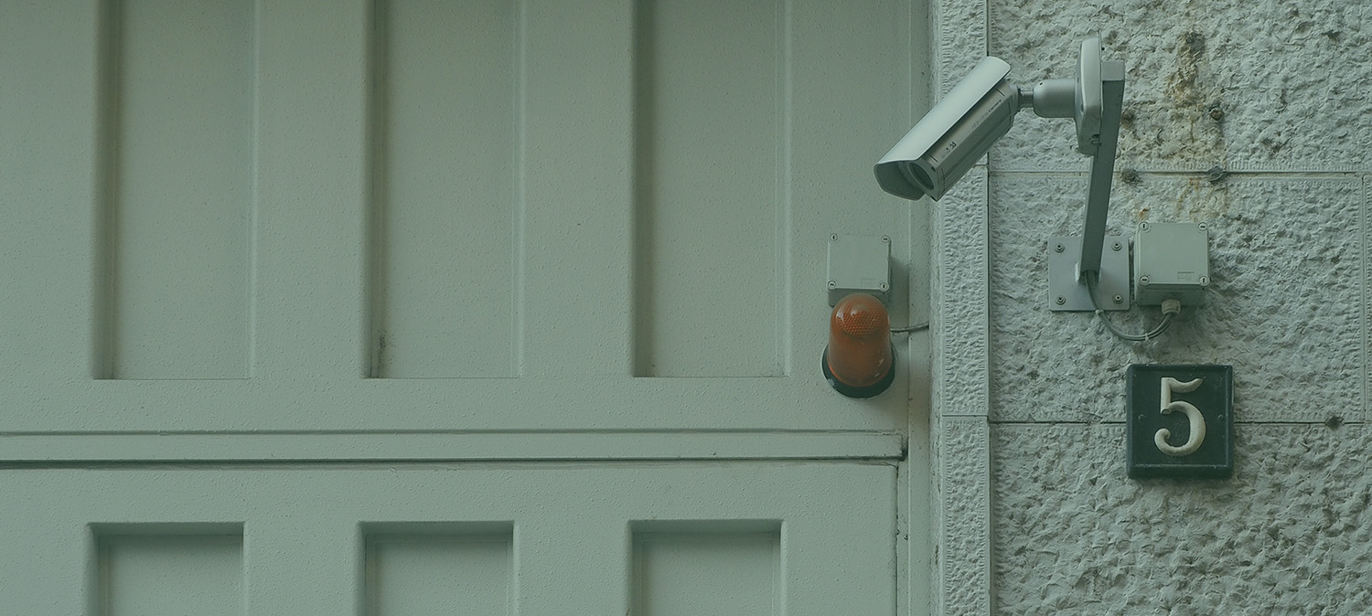 security camera pointed down at a doorway